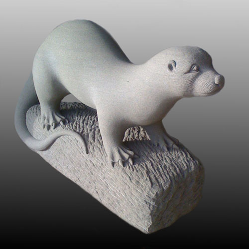 Image of a carved otter linking to carving pages